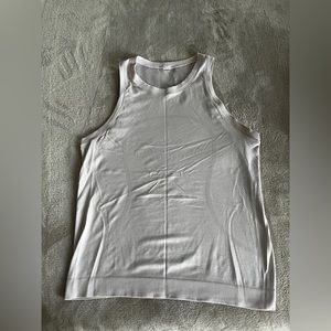 Lululemon blush colored tank.  NO size tag fits like size 6